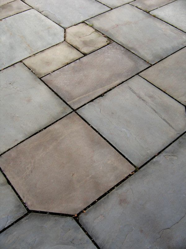 Finishing brings out the natural beauty and rich color variations of slate flooring
